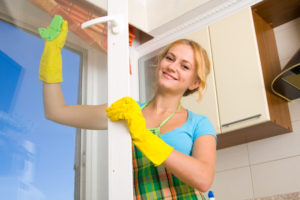 Women cleaning a window